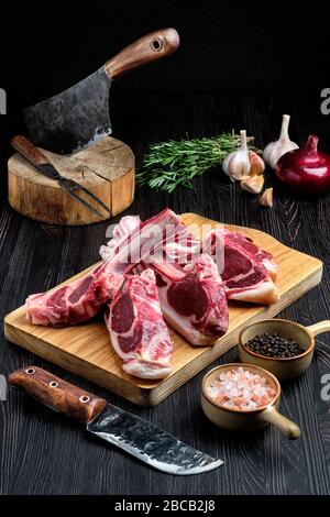 Fresh raw rack of lamb on cutting board Stock Photo