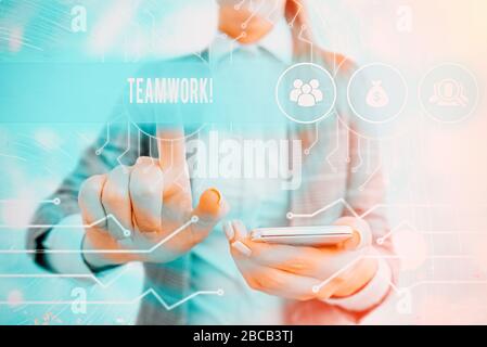 Handwriting text writing Teamwork. Conceptual photo combined action of group especially when effective and efficient Stock Photo