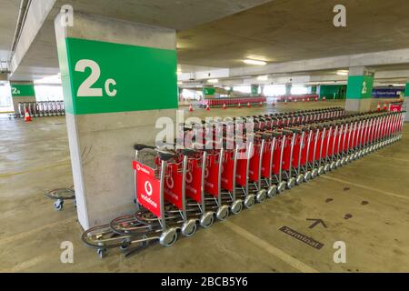 Sydney, Australia. 04th Apr, 2020. As the Australian airline industry faces an increasingly uncertain future as a result of the impact of the COVID-19 Coronavirus, the carpark at Sydney International Airport has become empty of air travellers and their cars and holds hundreds of now un-needed passenger baggage trolleys. Credit: Robert Wallace/Alamy Live News Stock Photo