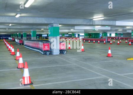 Sydney, Australia. 04th Apr, 2020. As the Australian airline industry faces an increasingly uncertain future as a result of the impact of the COVID-19 Coronavirus, the carpark at Sydney International Airport has become empty of air travellers and their cars and holds hundreds of now un-needed passenger baggage trolleys. Credit: Robert Wallace/Alamy Live News Stock Photo