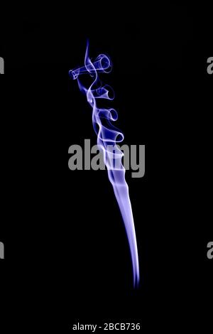 colored smoke shapes with black background Stock Photo