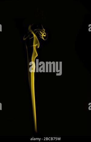colored smoke shapes with black background Stock Photo