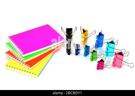 Colorful notepads clip for paper on a white background in the correct geometry Stock Photo