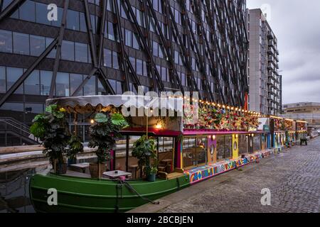 Darcie and May Green barge, a floating restaurant, Paddington Basin,  Grand Union Canal, Paddington London UK Stock Photo