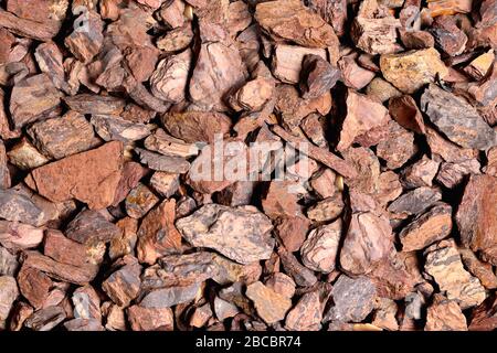 Small crushed stones of red-gray color, background Stock Photo