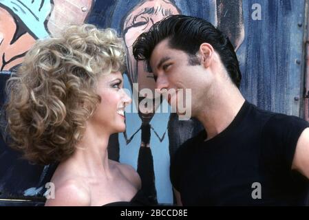JOHN TRAVOLTA and OLIVIA NEWTON-JOHN in GREASE (1978), directed by RANDAL KLEISER. Credit: PARAMOUNT PICTURES / Album Stock Photo