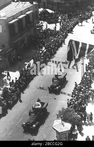 English British Armoured Vehicles Parading Through Allenby Street In Tel Aviv In Honor Of The Silver Jubilee Of King George V O O O U O U E O O O O U E O E O U U C I O O O U U C O U E U