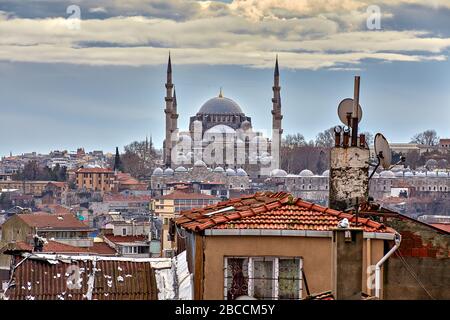 Istanbul, Turkey - February 12, 2020: Residential buildings and a mosque in the Fatih area. Stock Photo