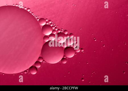 Purple bubbles of oil and water Stock Photo