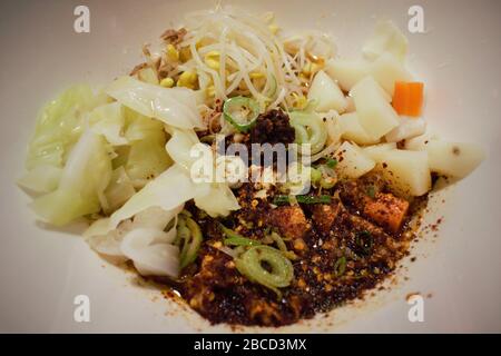 Spicy hot oil seared noodles Biang Biang Mian, Chinese noodle dish Stock Photo
