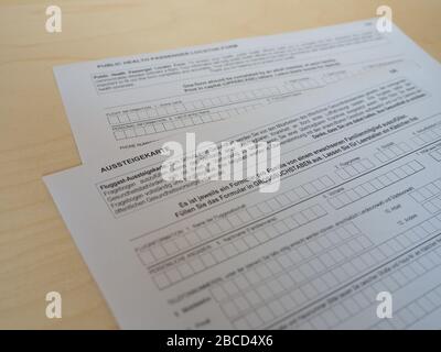 BERLIN, GERMANY - CIRCA MARCH 2020: Fluggast Aussteigekarte (translation:  Passenger Locator Form) Stock Photo