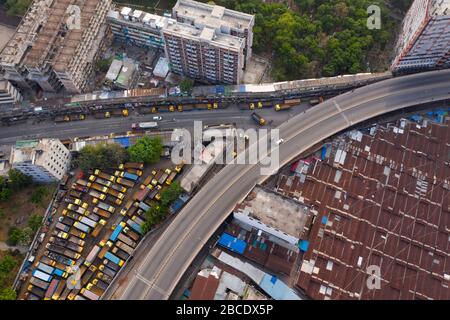 DHAKA, BANGLADESH - APRIL 04: Trucks are parked in the terminal in Dhaka city during government-imposed lockdown as a preventive measure against the C Stock Photo
