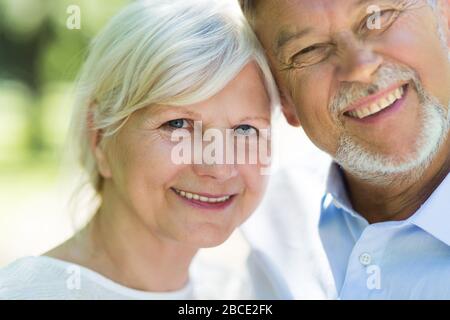 Senior Couple Sitting Park Stock Photo
