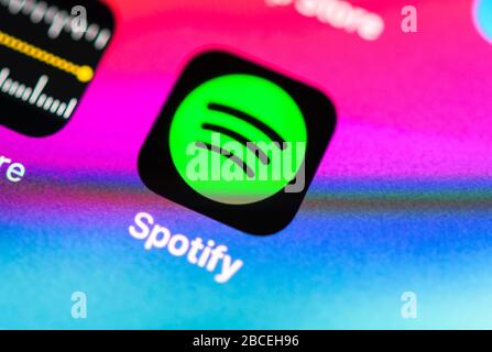 Spotify App, music streaming service, app icon, display on one screen of mobile phone, iPhone, iOS, smartphone, macro shot, detail, full format Stock Photo