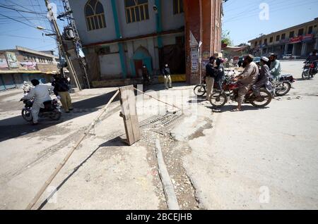 Peshawar, Pakistan. 04th Apr, 2020. Security officials stand high alert to avoid untoward incident and maintained law and order situation during nationwide lockdown due to increasing in corona virus cases as preventive measure against the spread of the Corona virus (COVID-19). (Photo by Hussain Ali/Pacific Press) Credit: Pacific Press Agency/Alamy Live News Stock Photo