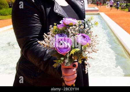 A flower bouquet in the hand´s bride Stock Photo