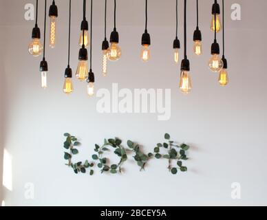 Set edison retro lamp on loft gray concrete background. Concept idea. Love. Warm. Stock Photo