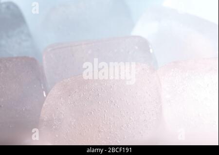 Melting ice cubes macro close up view. Icy background Stock Photo