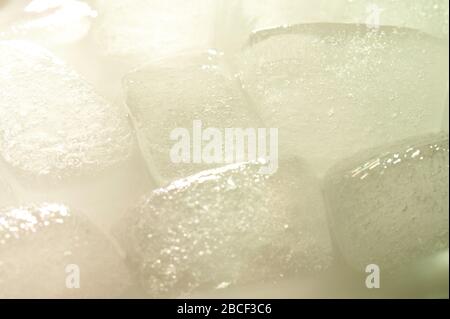 Close up view of melting ice with back light reflection Stock Photo