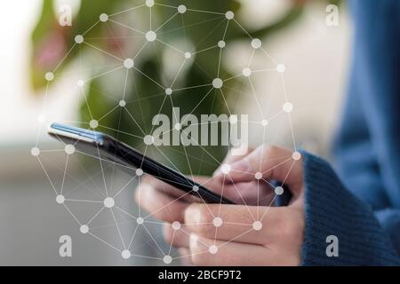 Woman using smartphone. Digital data network Stock Photo
