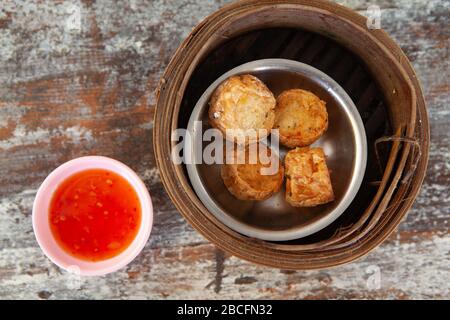 Hoi Jo or deep fried crab meat roll is Thai Traditional one of menu in dim sum restaurant Stock Photo