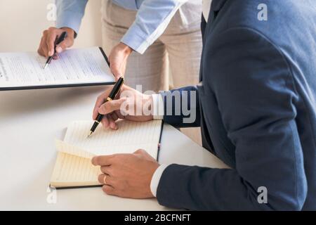 Male lawyer or judge consult with client check contract papers recommend legal proposals, Law services concept. Stock Photo