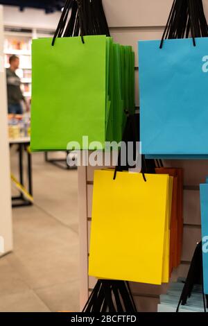 Packages for purchases. Colorful bags in the trading floor. Close-up Stock Photo