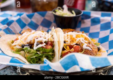 These colorful fish tacos are available at the Pelican Cafe' in Stuart, Florida, USA. Stock Photo