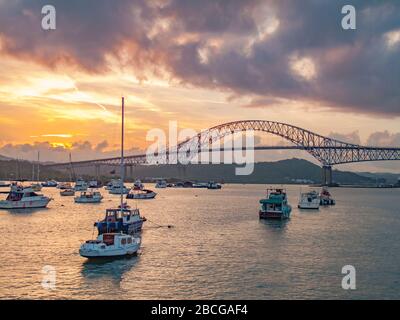 yachts anchoring under the Bridge of the Americas in Balboa at the exit of the Panama Canal Panama Stock Photo