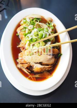 Chinese drunken chicken recipe with ginger and spring onions, Lombardy, Italy, Europe Stock Photo