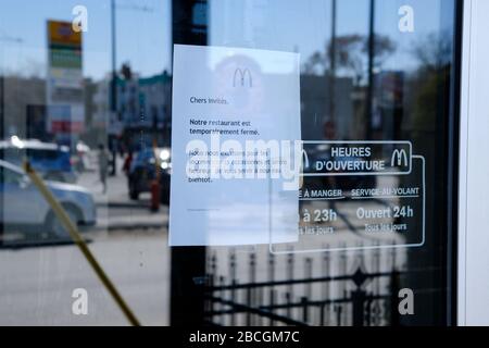 Montreal, Quebec, Canada. April 4th, 2020. Third McDonald's restaurant on the island of Montreal to close after one of its employees tested positive for Covid19. McDonald's announced the location at 6415 Sherbrooke Street East was closing because an employee who worked there on March 26 said he had tested positive for the coronavirus. The fast-food chain decided to close the outlets immediately so the restaurants can be thoroughly cleaned and sanitized by a professional cleaning company. The restaurants will reopen once public health allows. Stock Photo