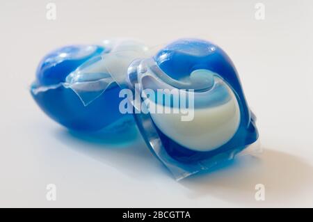 Laundry washing machine gel in blue and white isolated on white background Stock Photo