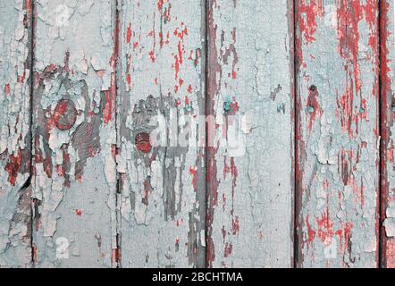 Painted old cracked wooden wall. Blue red. Texture. Stock Photo
