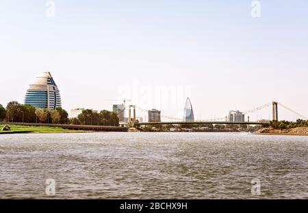 View at Khartoum city scape with Burj Al Fateh hotel, the bridge over river Nile and modern buildings at the background. Stock Photo