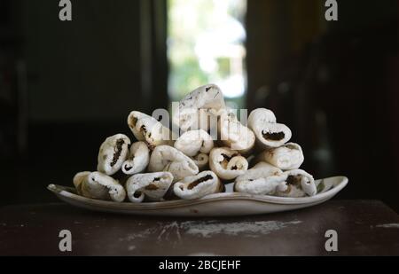 TIL PITHA, a Traditional sweet (food) of Assam. Stock Photo