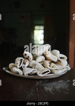 TIL PITHA, a Traditional sweet (food) of Assam. Stock Photo