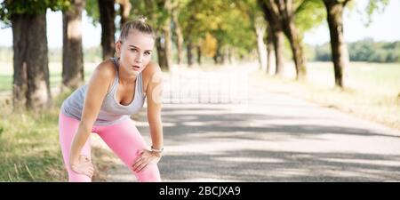 young woman stretching Stock Photo