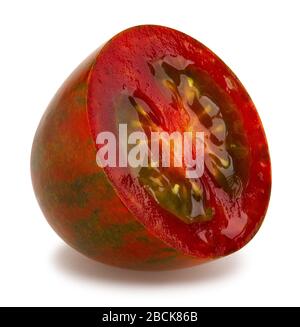 sliced kumato plum tomato path isolated on white Stock Photo