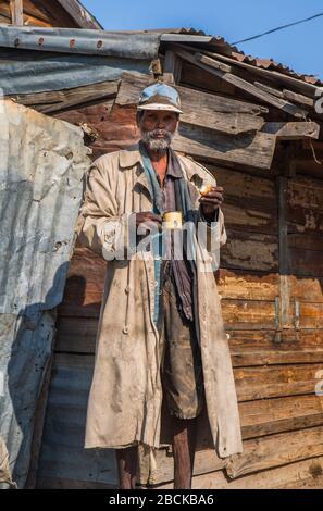 Africa, Madagascar, Ilhorombe region, Ilakaka. Man in front of his house. Stock Photo