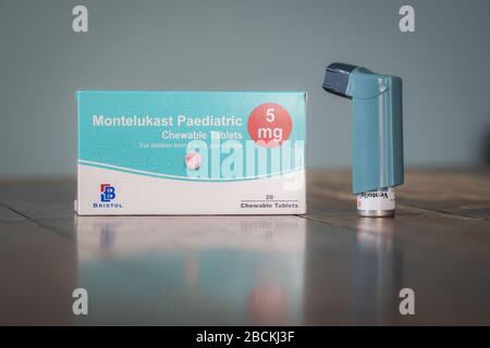 London, UK - April 3, 2020 - Ventolin metered dose inhaler and montelukast tablets; commonly prescribed medicationsa for asthma treatment Stock Photo