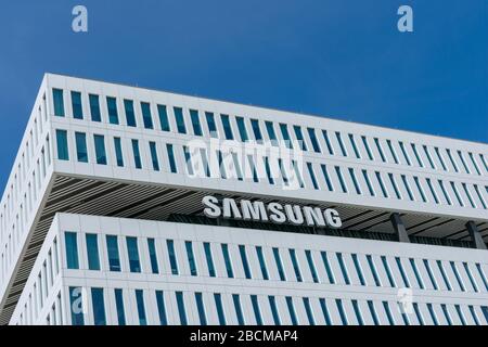 Samsung logo is displayed on South Korean multinational conglomerate LEED platinum certified building in Silicon Valley - San Jose, California, USA - Stock Photo