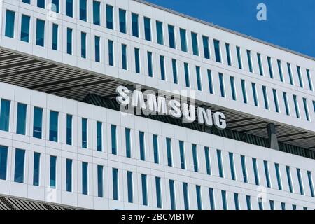 A logo sign outside of the headquarters of Samsung Pay in Burlington ...