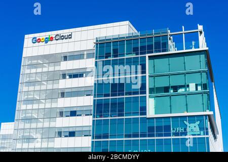 Google Cloud HQ facade with WFH, work from home, sign. Google told employees to work from home as a precaution against coronavirus spreading Stock Photo