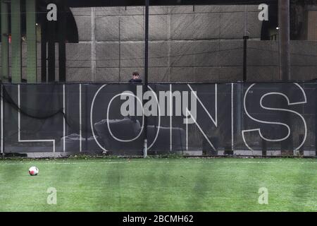 New York, New York, USA. 4th Apr, 2020. Boy observes empty soccer field at Hudson River Park in New York City in the United States this Saturday, 04. New York City is the epicenter of the Coronavirus pandemic Credit: William Volcov/ZUMA Wire/Alamy Live News Stock Photo