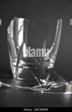 Broken Glass Cup with Pieces and Fragments on Dark Black Background,  Concept of Danger Stock Image - Image of cafeteria, annoyance: 177987907