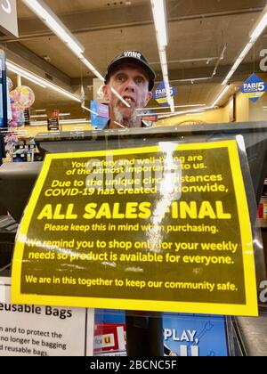 Santa Barbara, California, USA. 30th Mar, 2020. New safety measures to combat the spread of the deadly Covid-19 virus In the last week at Safeway Grocery Stores across Santa Barbara County include the installation of safety glass, only allowing one customer at the check-out counter and signs that read 'Do to the unique circumstances Corona Virus has created nation wideÃ‰ all sales are final. Credit: Amy Katz/ZUMA Wire/Alamy Live News Stock Photo