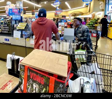 Santa Barbara, California, USA. 30th Mar, 2020. New safety measures to combat the spread of the deadly Covid-19 virus In the last week at Safeway Grocery Stores across Santa Barbara County include the installation of safety glass, only allowing one customer at the check-out counter and signs that read 'Do to the unique circumstances Corona Virus has created nation wideÃ‰ all sales are final. Credit: Amy Katz/ZUMA Wire/Alamy Live News Stock Photo