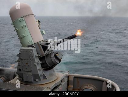 ATLANTIC OCEAN (Mar. 13, 2020) The Wasp-class amphibious assault ship USS Iwo Jima (LHD 7) conducts a Close-in Weapon System (CIWS) Pre-action Aim Calibration (PAC) fire exercise, Mar. 13, 2020. CWIS PAC fire is a scheduled exercise performed to enhance the crew’s ability to operate the weapon. (U.S. Navy photo by Mass Communication Specialist 3rd Class Jessica Kibena/Released) Stock Photo