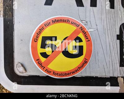 Munich, Bavaria, Germany. 5th Apr, 2020. An anti 5G cellular sticker near Lake Starnberg indicates the reach of conspiracies against the new technologies. Many are now pushing conspiracies that it is responsible for the Coronavirus crisis, particularly in the QAnon circles. Credit: Sachelle Babbar/ZUMA Wire/Alamy Live News Stock Photo