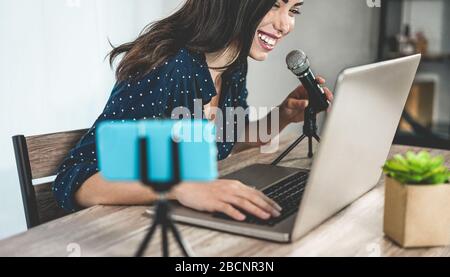 Girl influencer girl preparing video set while creating social media contents - Young woman having fun with technology trends - New smart working conc Stock Photo